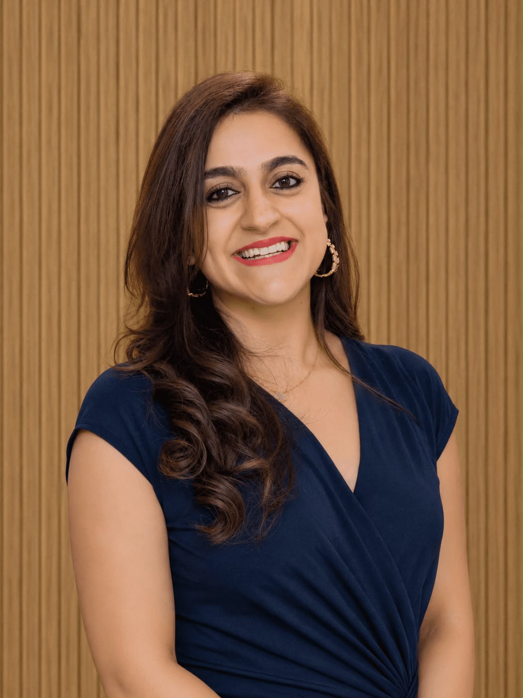 Dr. Smriti Malhotra Nanda, orthodontist, reviewing an Invisalign plan